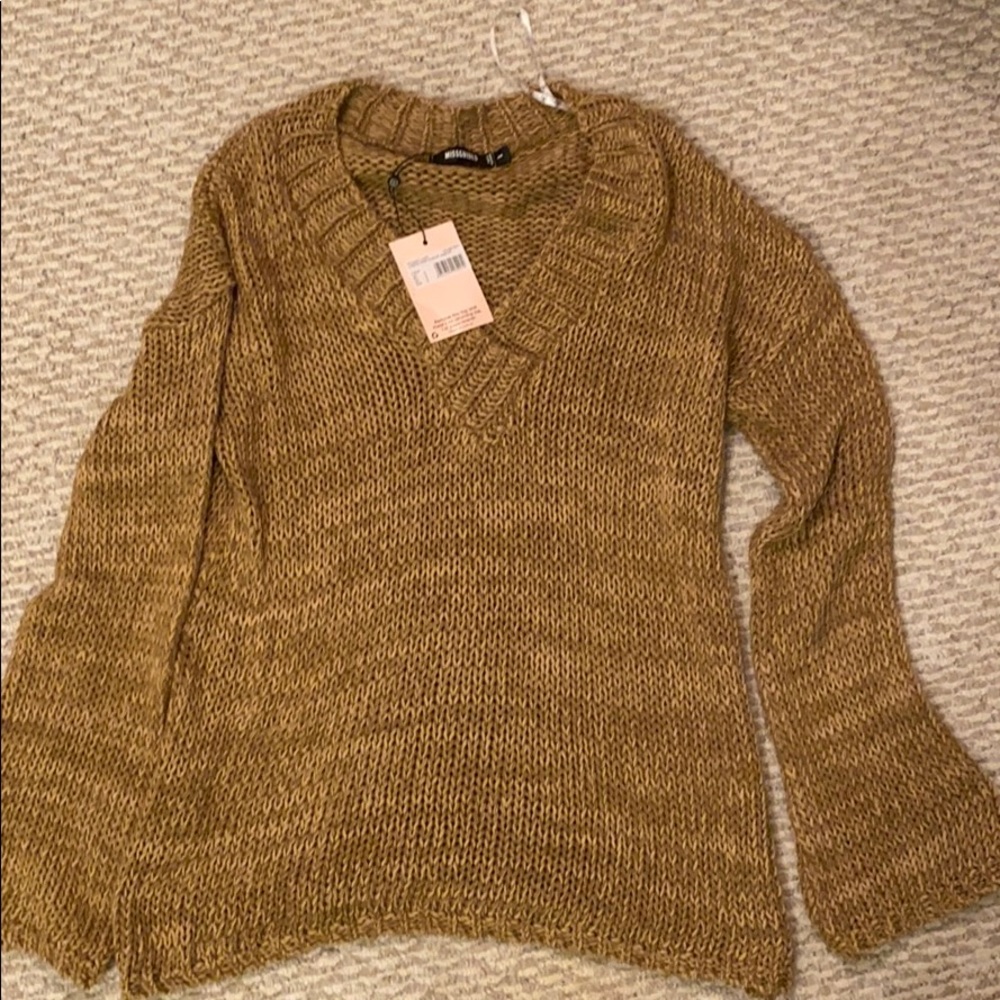 tan sweater